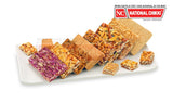 Nationala's  Delux Mix Chikki (Almond, Pista with cashew chikki, cashew, cashew nut, roasted coconut, rajgeera with groundnut)