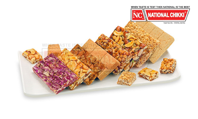 Nationala's  Delux Mix Chikki (Almond, Pista with cashew chikki, cashew, cashew nut, roasted coconut, rajgeera with groundnut)